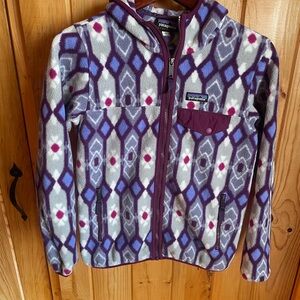 Patagonia Purple and White Geometric Fleece zip up hoodie.